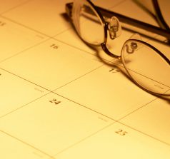 Spectacles on top of calendar