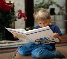 Boy reading book